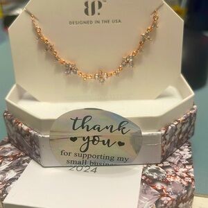 BP bomb party classic details April 24 necklace in rose gold plating